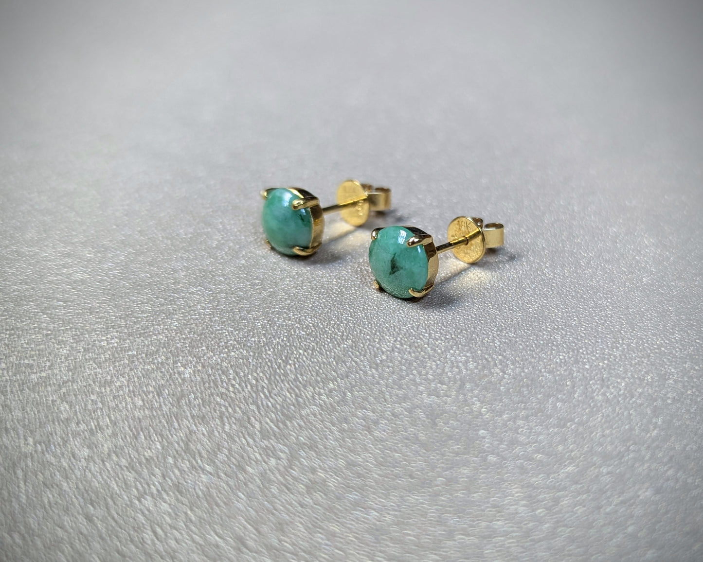Green jade stud earrings with 18k yellow gold claw setting | TRACE Jade