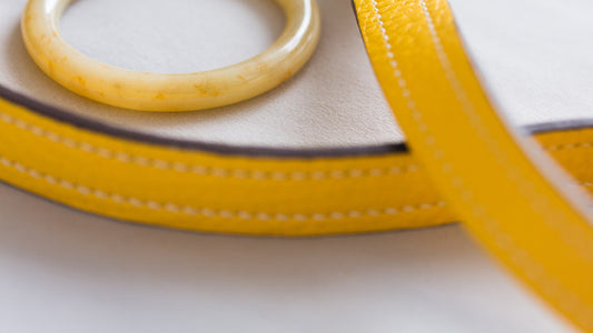Yellow jade bangle by TRACE and leather strap by Just Campagne