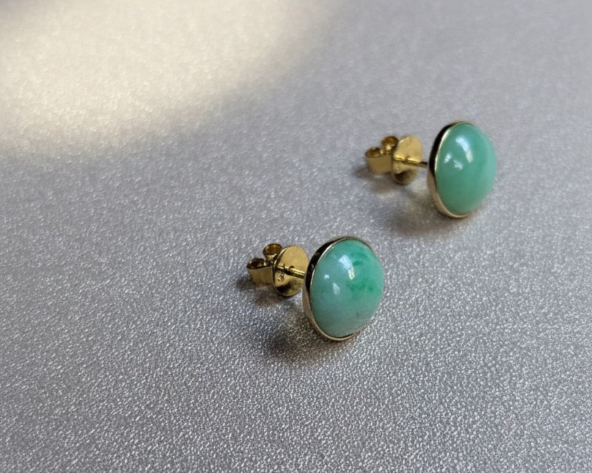Pair of light green jade stud earrings, set in 14k yellow gold | TRACE Jade