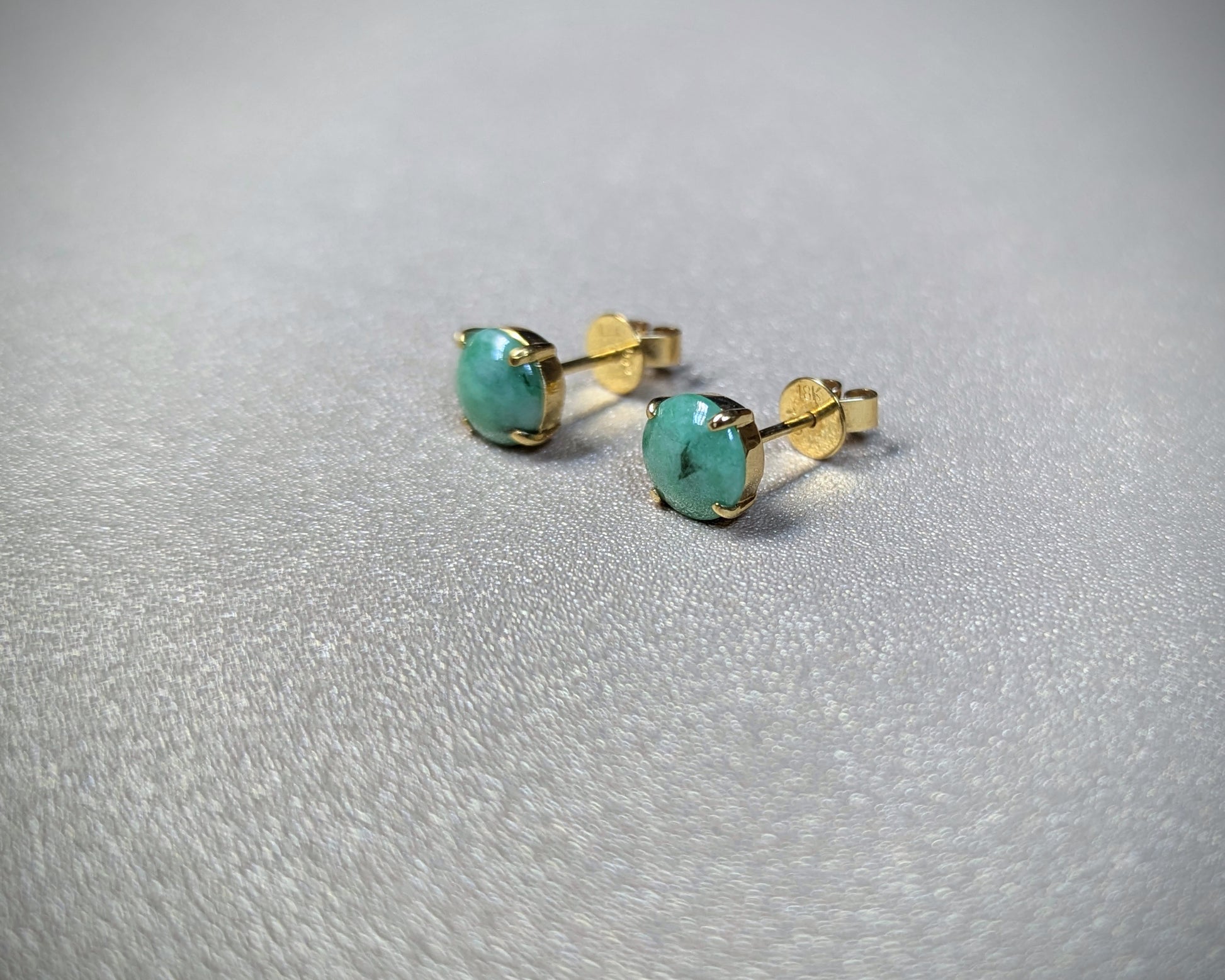 Green jade stud earrings with 18k yellow gold claw setting | TRACE Jade