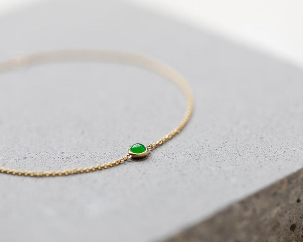 Intense green round jadeite bracelets | Solid jade bracelets at TRACE