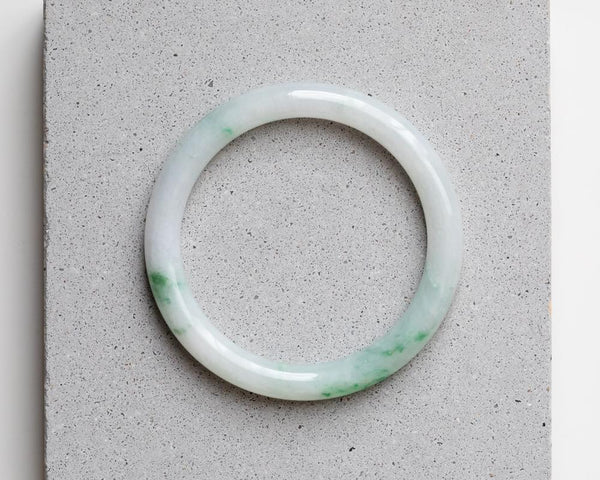 White Jade Bangle with Green Specks | Grade A Jadeite Bangle | Jade jewelry by TRACE