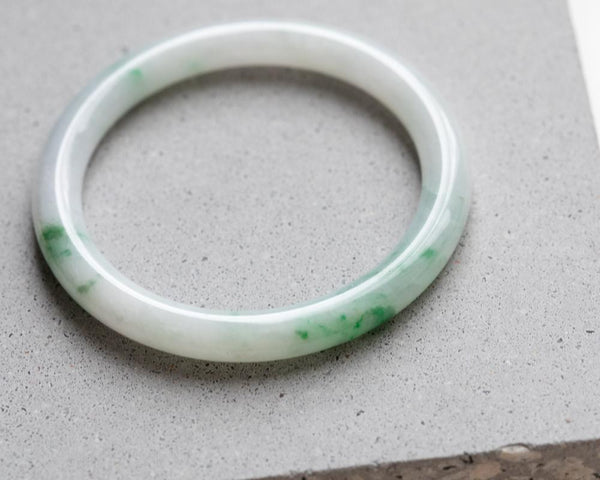 Speckled green and white jade bangle | Solid jade bangles at TRACE